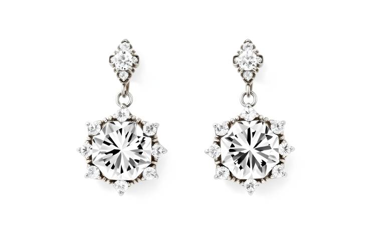 Chic Group of Diamond Earrings with Step Size on White Background